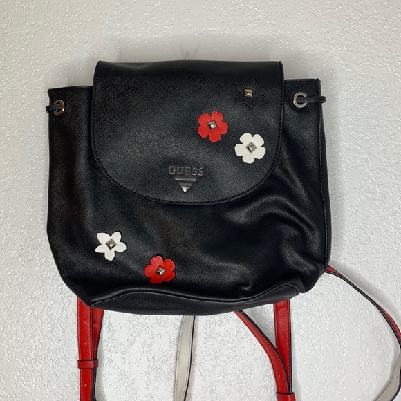 red backpack with white straps